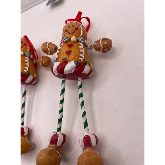 Pair of Gingerbread Girl Ornaments – Candy Trim, Swing Legs, Lollipop Detail, - Picture 3 of 7